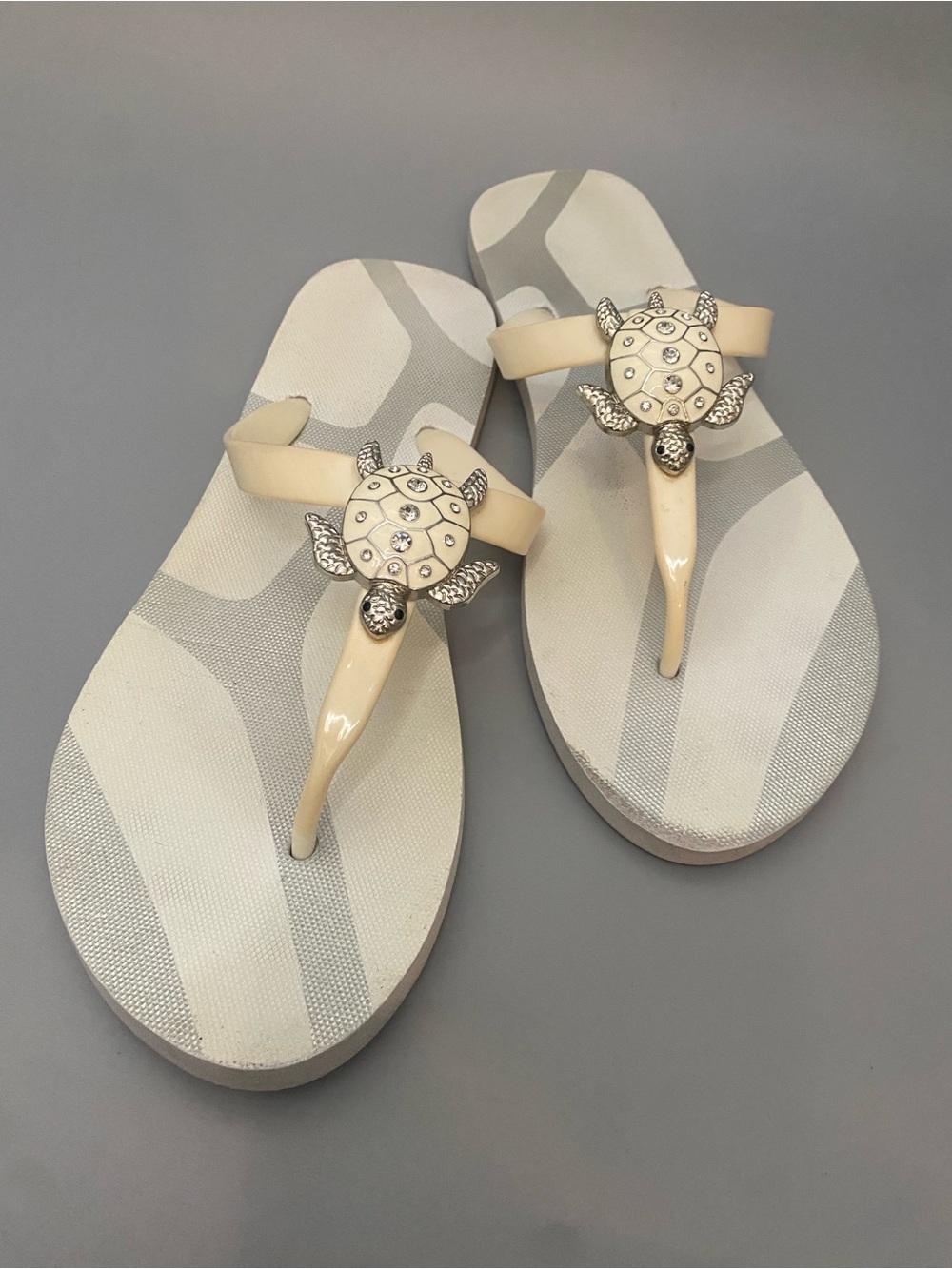 Turtle Embellished Flip Flop Sandals Cream White Metallic